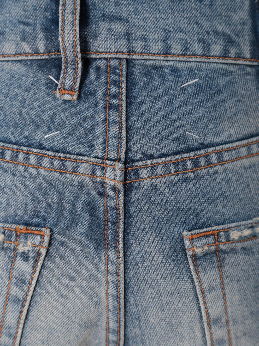 Cotton jeans with ripped profiles