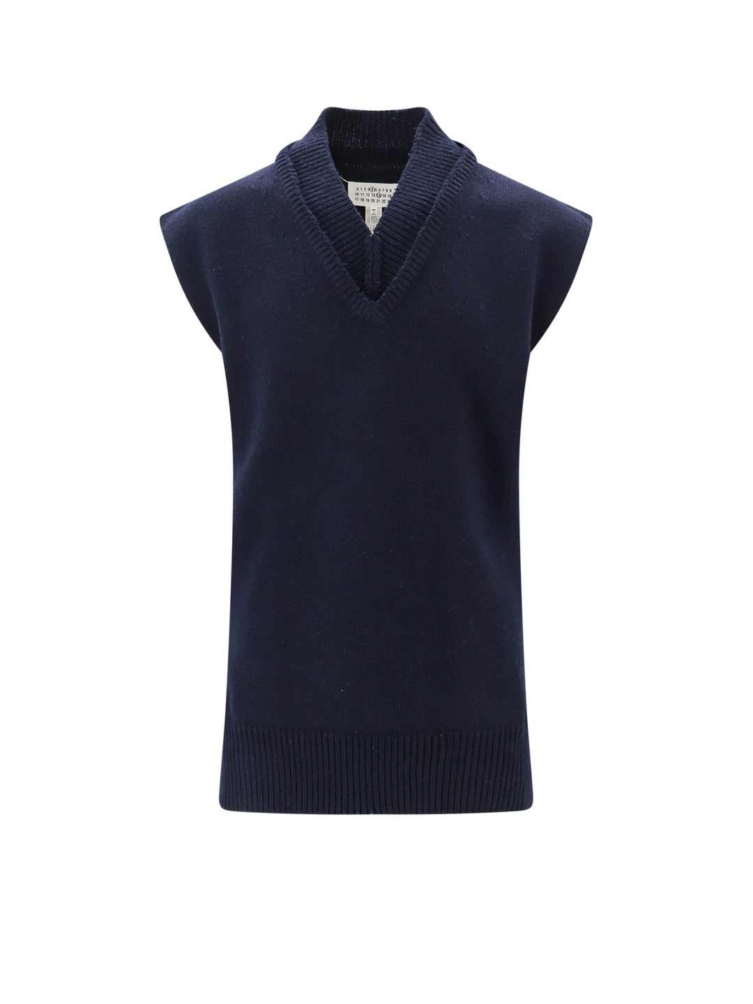 Wool, linen and cotton vest.  The peculiarity of this garment is given by fabric raw cutted that tends to ladder