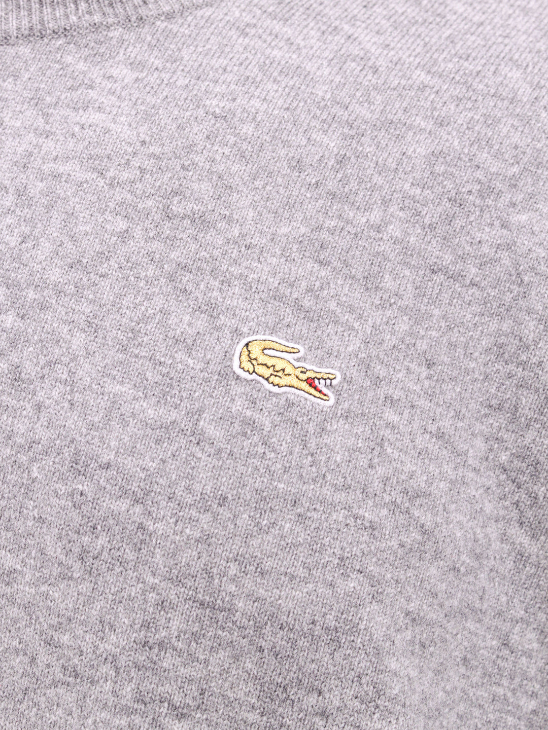 Wool sweater with embroidered Lacoste patch