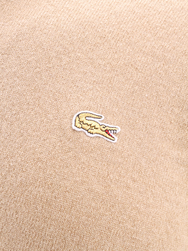 Wool sweater with embroidered Lacoste patch