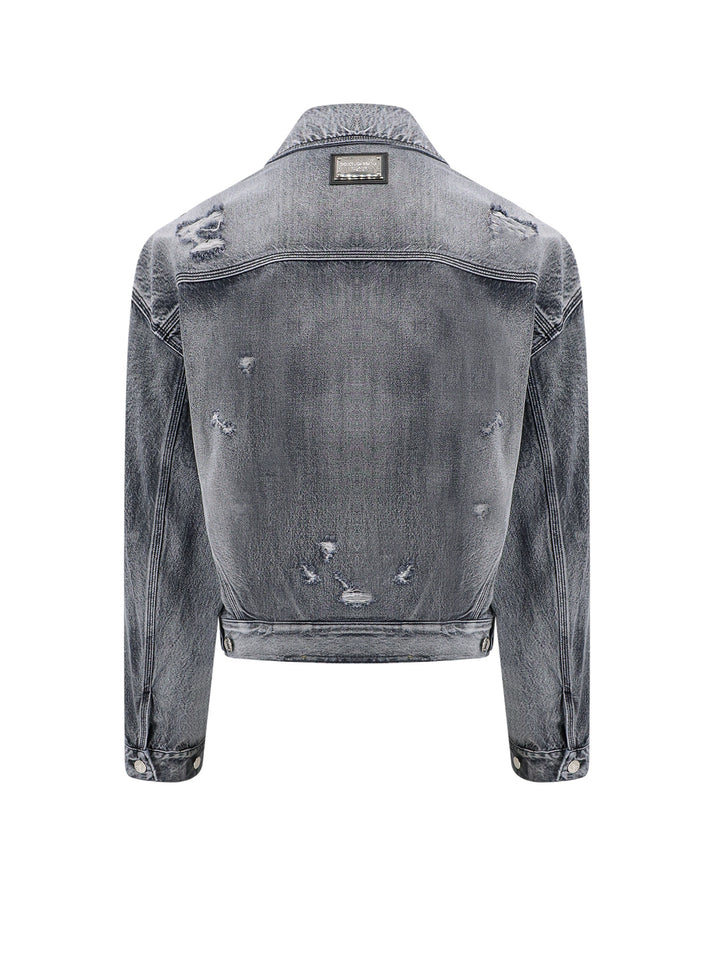 Denim jacket with ripped effect