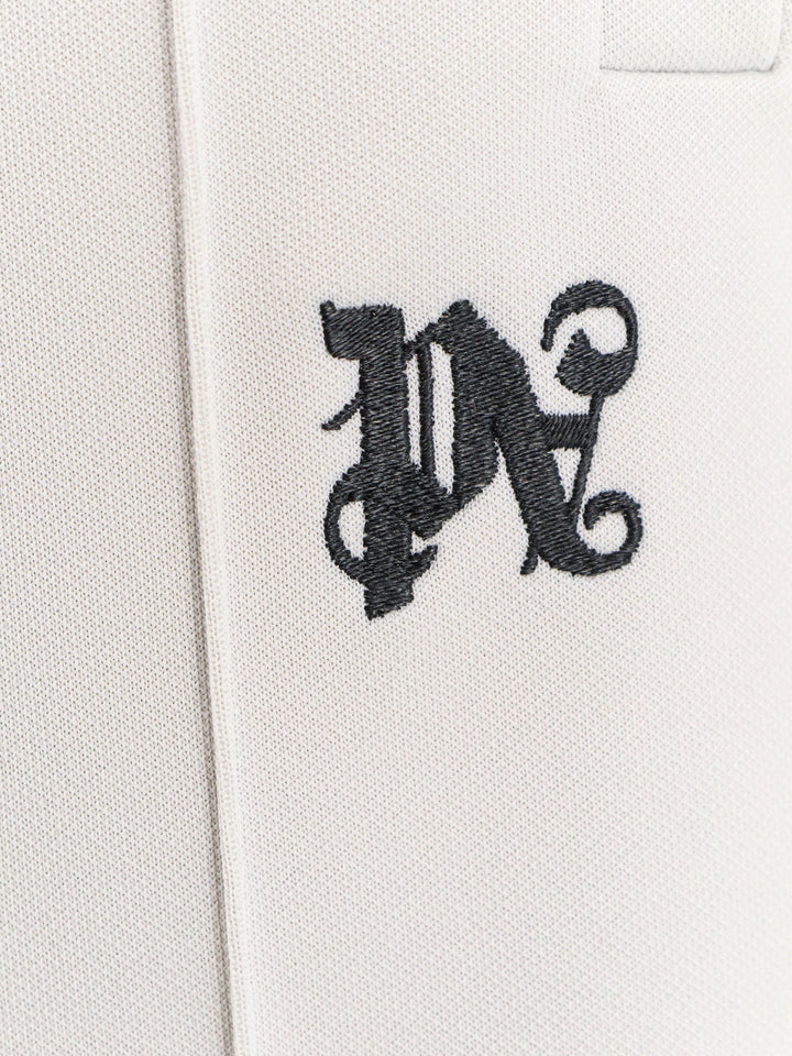 Trouser with embroidered monogram on the front