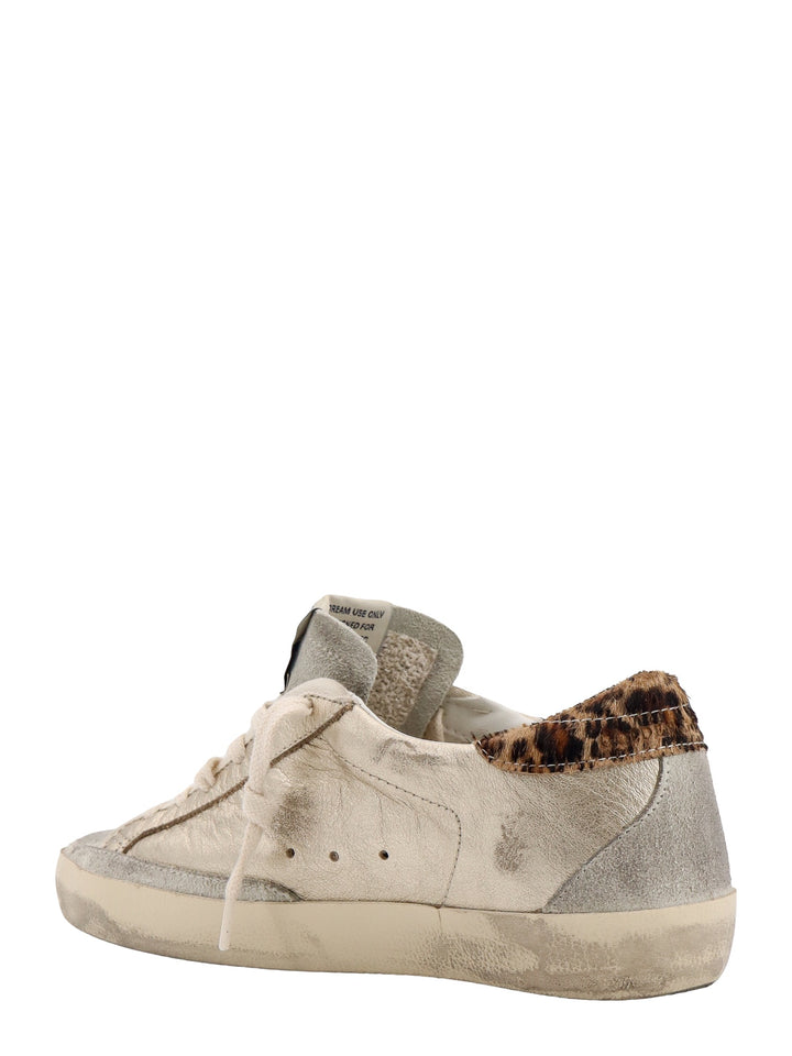 Laminated leather and suede sneakers with animalier patch