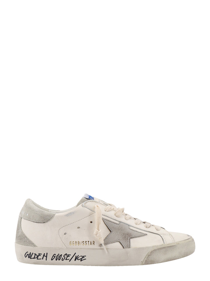 Leather sneakers with suede profiles