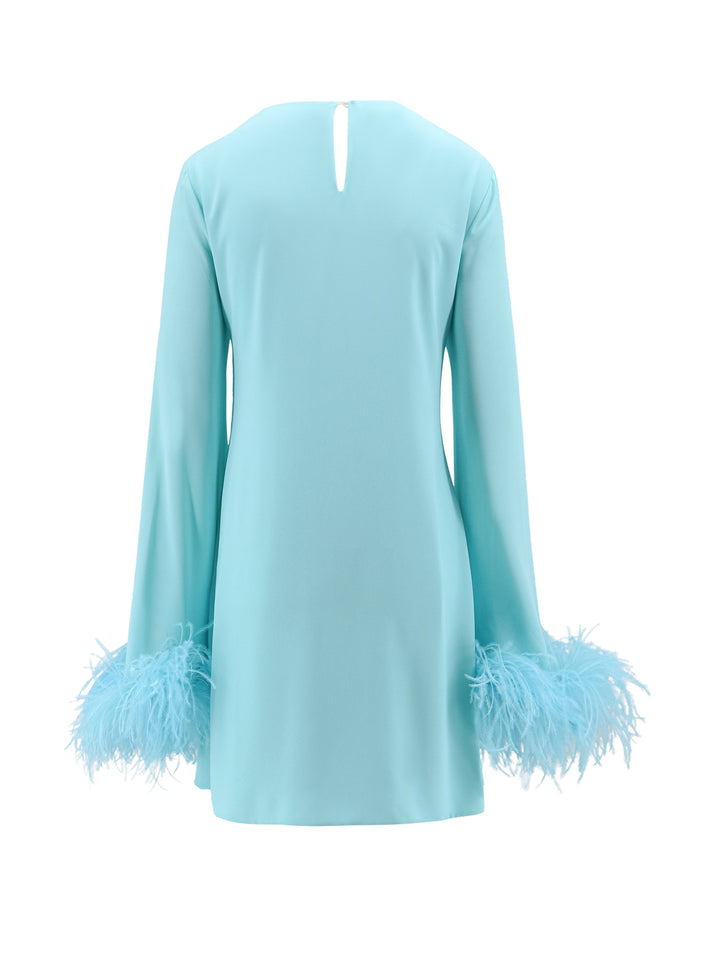 Dress with natural feathers with knot on the front