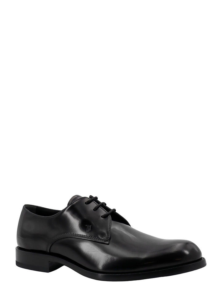 Patent leather lace-up shoe