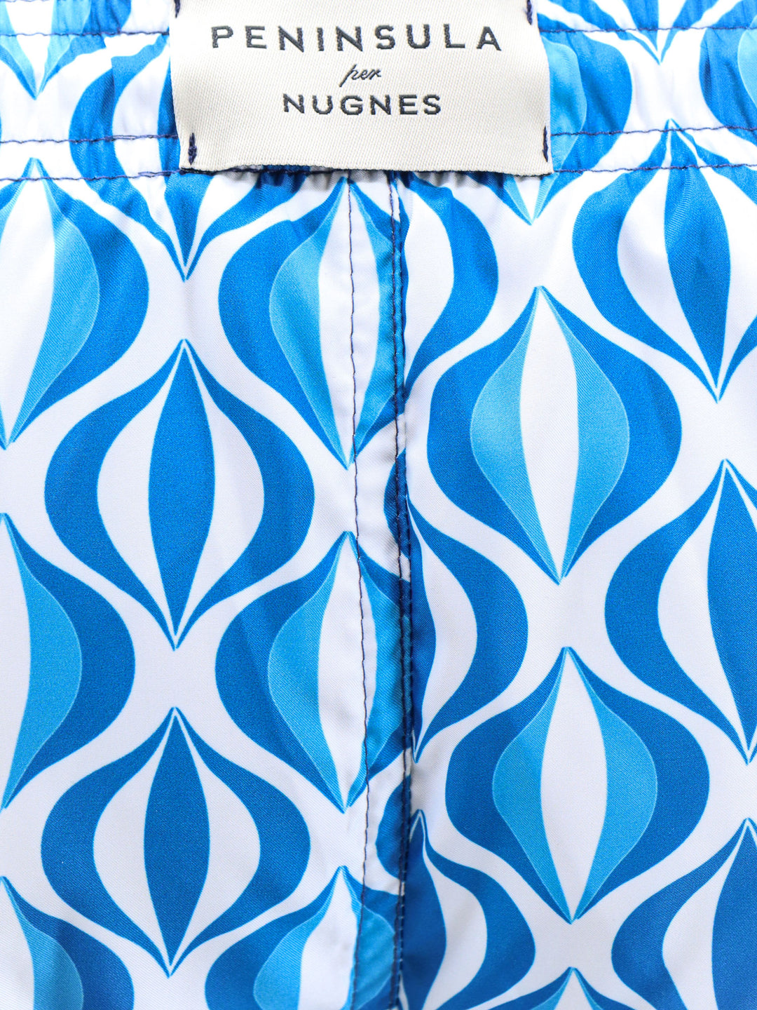 Recycled nylon swim shorts with all-over print