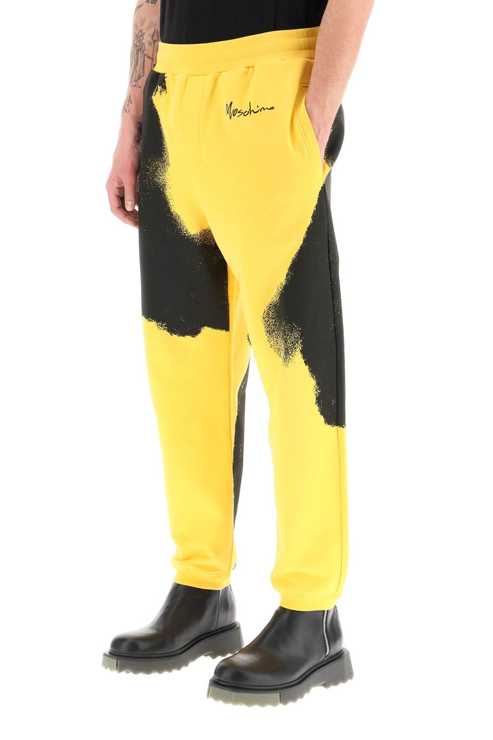 Graphic Print Jogger Pants With Logo - Moschino - Men