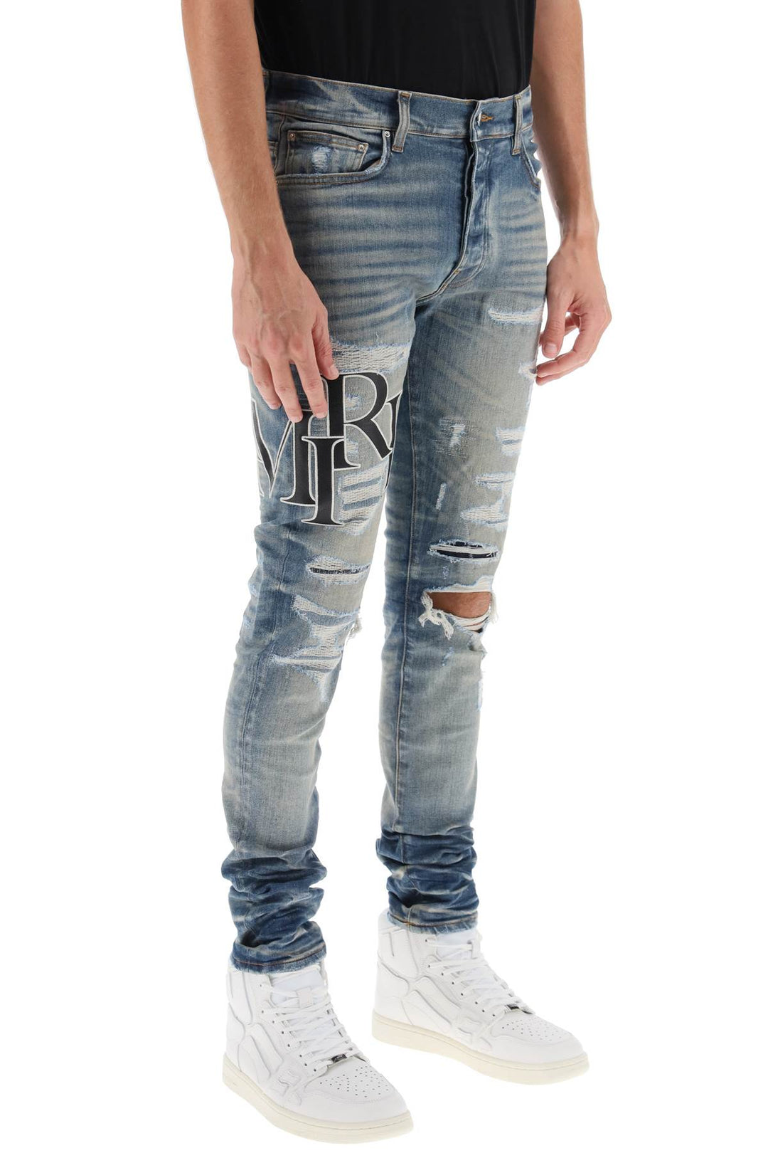 Destroyed Jeans With Staggered Logo - Amiri - Men