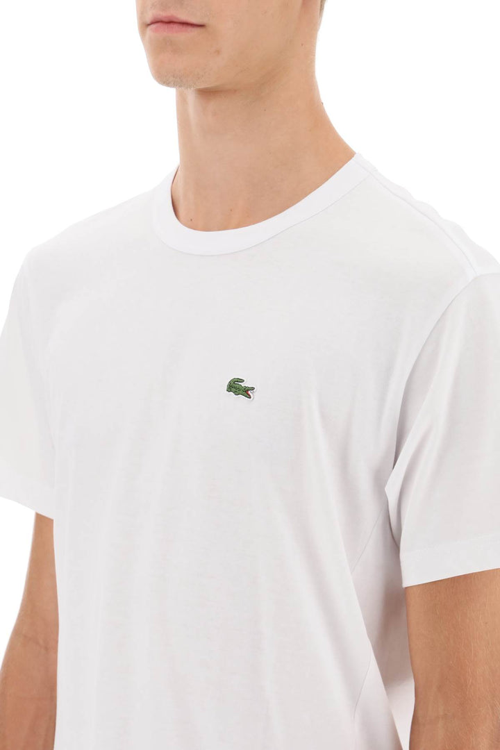 X Lacoste Asymmetrical T Shirt - Comme Des Garçons Shirt - Men